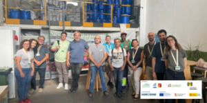 Foto de grup de la instal·lació dels sensors volumètrics als contenidors de Solidança